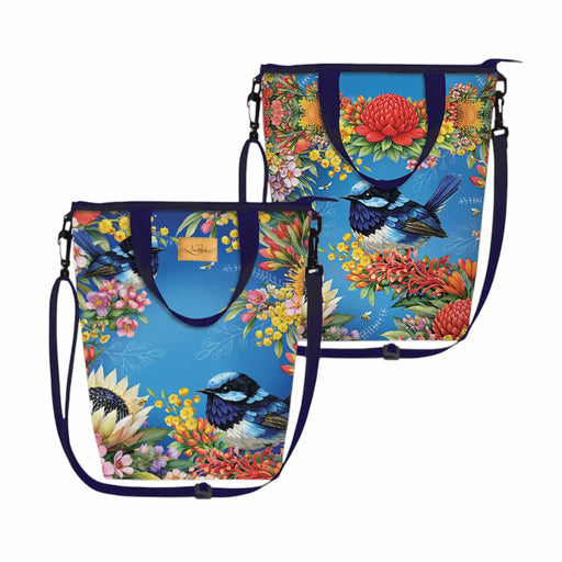 Two tote bags with a vibrant blue background and a detailed tropical floral and bird print, shown on a plain white background.