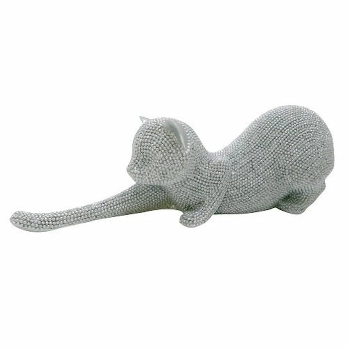 A silver rhinestone-covered figurine of a stretching cat, shown against a plain white background.