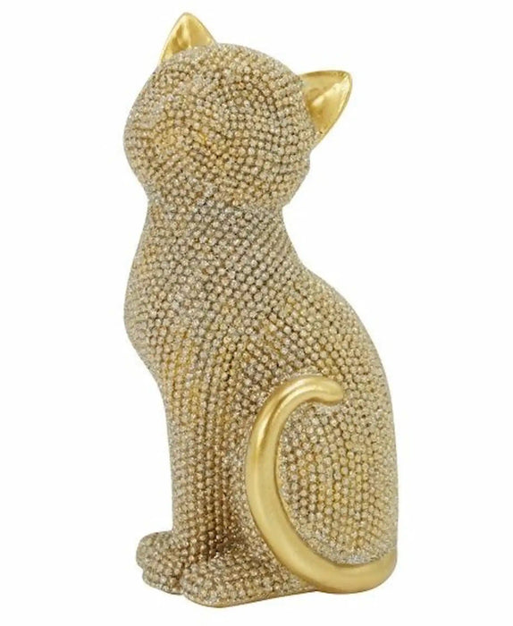 A gold-colored cat figurine covered in small clear rhinestones, shown from a side profile against a plain white background.