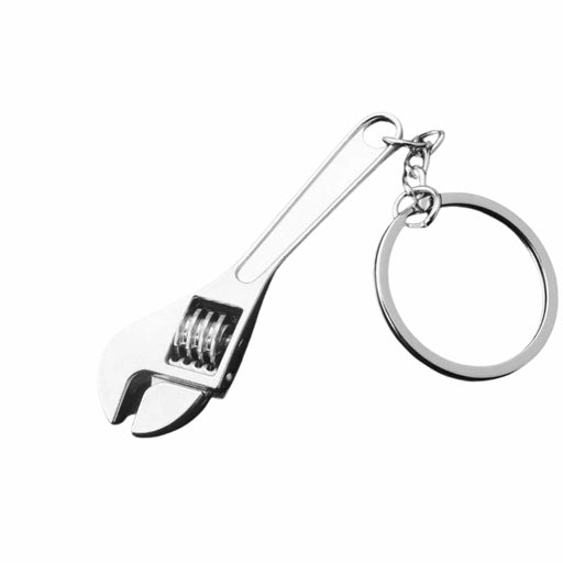 A silver wrench-shaped keychain with an adjustable wrench head, spring detail, handle, and attached metal key ring on a plain white background.