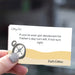 Card with humorous message about Father's Day deodorant, held by a hand.