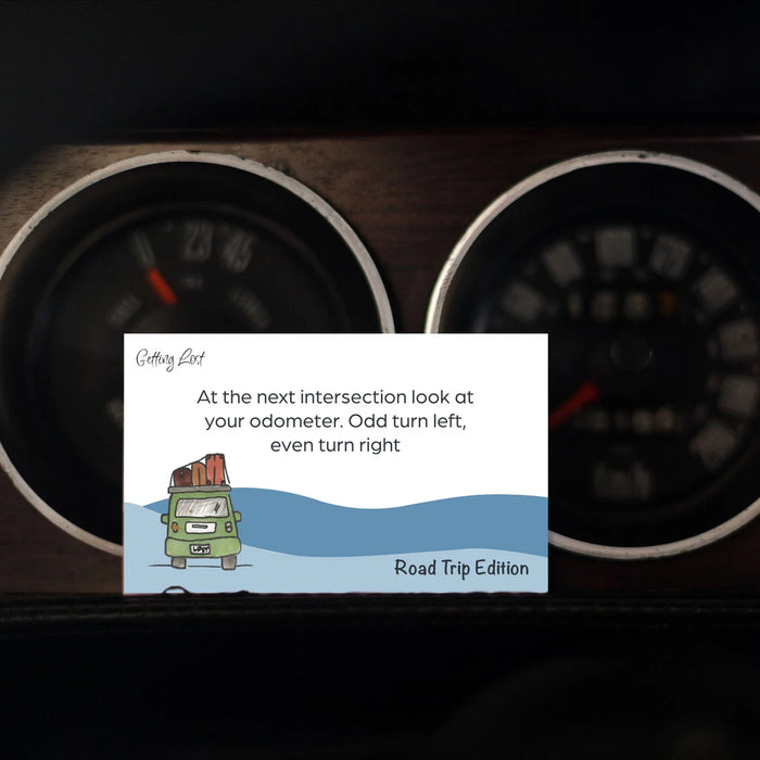 Card with road trip advice over a car dashboard background