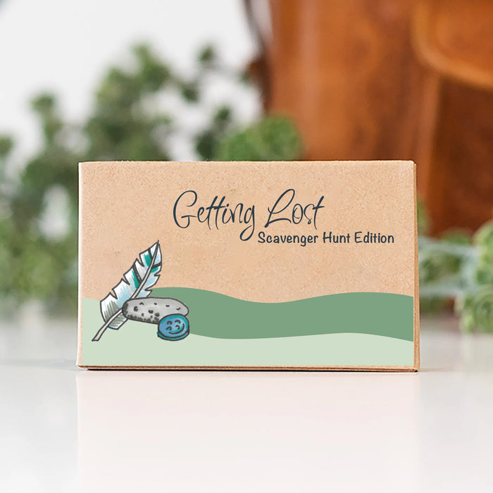 Product packaging with illustration of a person walking and text 'Getting Lost Solo Adventurers Edition' on a natural background.