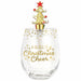 A clear stemless wine glass with gold glitter and the words 'A DANCING Christmas Cheer' printed on it, topped with a small gold Christmas tree and red star against a plain white background.