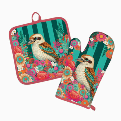 A matching kitchen set featuring a square pot holder and a oven mitt with a colorful kookaburra bird design, set against a teal and pink floral background with vertical stripes.