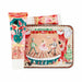 A coordinated gift set featuring a decorative tube and a rectangular tin with a whimsical illustrated scene of children on a stage, red curtains, and holiday motifs, photographed on a plain white background.