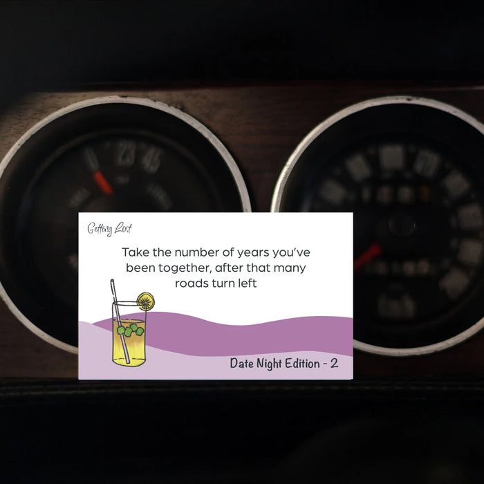 Card with text and a drink illustration on a car dashboard background