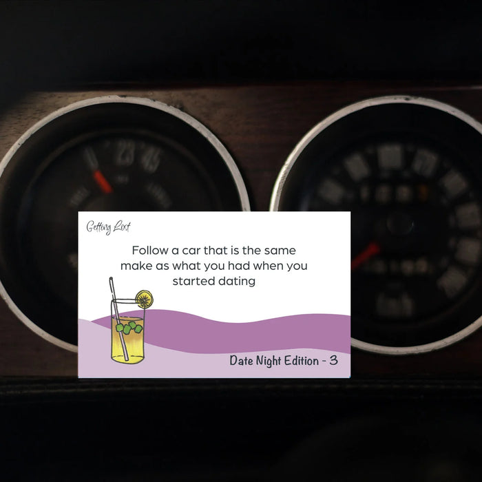 Card with text and a drink illustration on a car dashboard background