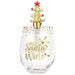 A clear stemless wine glass with gold 'Santa's Wine' lettering and gold polka dots, topped with a gold Christmas tree and red star decanter stopper, centered on a plain white background.