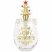 A clear stemless wine glass with gold foil text reading 'Drink Up Grinchies' and gold star details around the rim, topped with a gold Christmas tree ornament featuring red ornaments and a red star.