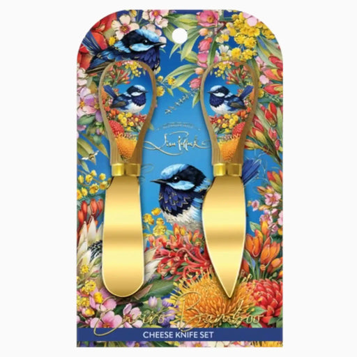 A cheese knife set in a decorative hanging card package. The set includes two gold-handled cheese knives with colorful printed bird and floral designs on the blades and backing card.