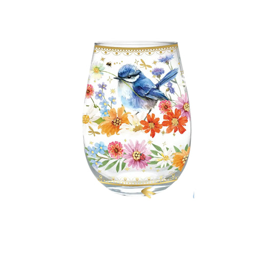 A clear stemless wine glass decorated with a colorful illustration of a blue bird holding flowers, surrounded by orange, pink, and blue blossoms with gold decorative borders at the top and bottom, shown on a plain white background.