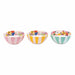 Three colorful ceramic bowls with floral patterns on a white background