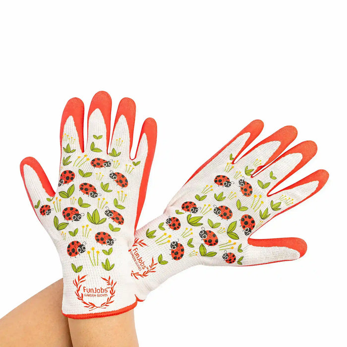 A pair of white knit gardening gloves with bright orange palms, fingers, and cuffs, decorated with a colorful pattern of ladybugs, leaves, and flowers. The gloves are being worn on hands, with the Funloaf brand logo visible on the wrist.