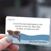 Card with humorous road trip instructions held by a hand