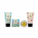 A set of three hand and body care products from The Happy Honey Bee: a blue tube of Vegan Honey Hand Cream, a pink tube of Vegan Honey Hand Wash, and a round tin of Organic Beeswax Hand Balm, arranged on a plain white background.