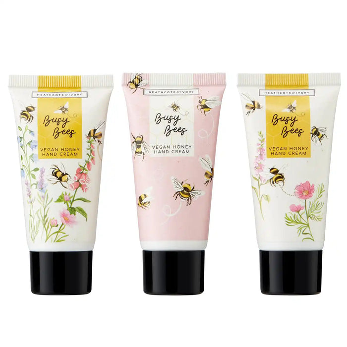 Three tubes of Busy Bees vegan honey hand cream on a white background