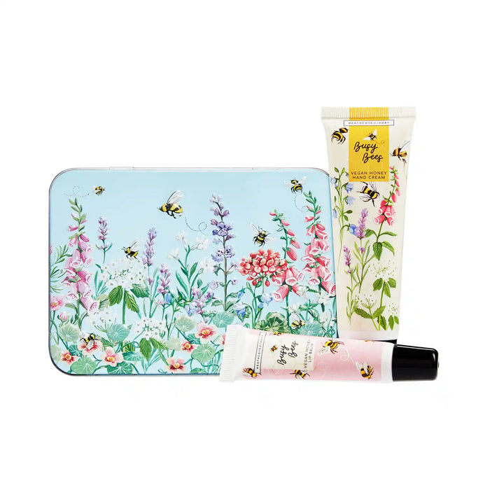 Two cosmetic tubes with floral design on a white background