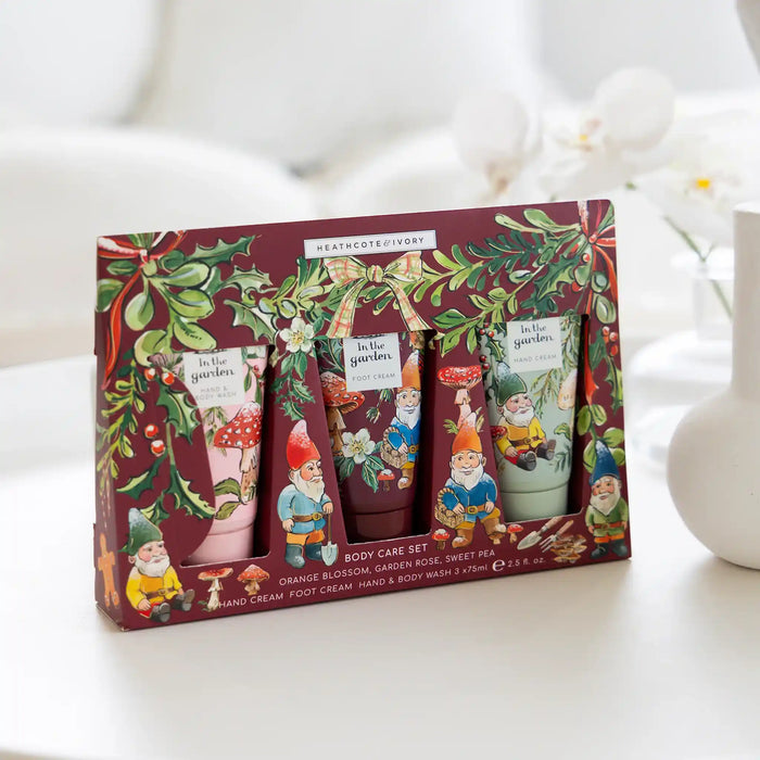 Heath & Cote Gardenery 'In the Garden' body care set in its original illustrated packaging, displayed on a white surface with a soft-focus background.