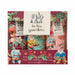 A boxed hand cream trio gift set labeled 'In the garden' with three decorated tubes visible inside a printed maroon box featuring gnomes, flowers, and mushrooms.