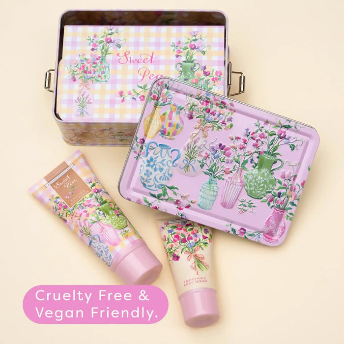 Cosmetic set with floral design on a light yellow background, featuring 'Sweet Pea' branding.