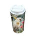 A white insulated travel tumbler with a flip-top lid, featuring a printed illustration of a white cockatoo perched among pink flowers and green foliage.