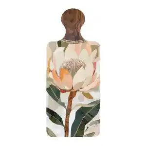 A rectangular wooden serving board with a rounded top handle, featuring a botanical print of a large cream and peach flower with green leaves on a light background.