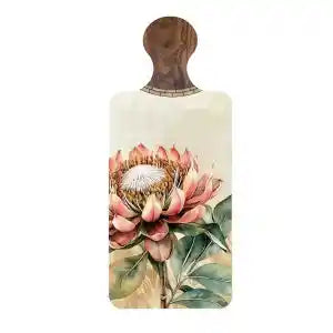 A rectangular wooden cutting board with a rounded handle, featuring a vintage-style watercolor illustration of a pink protea flower and green leaves on a light cream background.