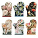 Six oven mitts arranged in a 2x3 grid, each featuring a different botanical and floral print including pink flowers, green leaves, and orange blossoms on dark and light backgrounds.
