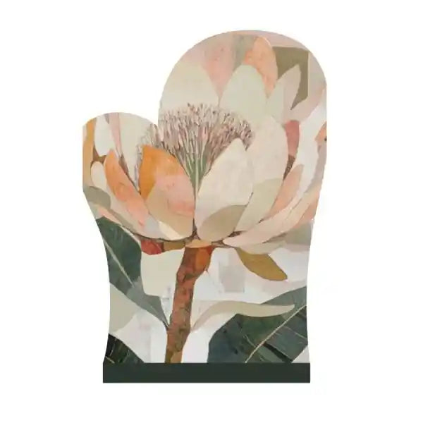 A decorative wall mirror shaped like a magnolia flower, featuring a botanical pattern in soft peach, cream, olive green, and brown tones, shown against a plain white background.