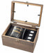 A wooden presentation box with a glass lid, containing a dark tumbler engraved with 'THE MYTH LEGEND' and a black leatherette pouch holding four silver-toned rings, on a white background.