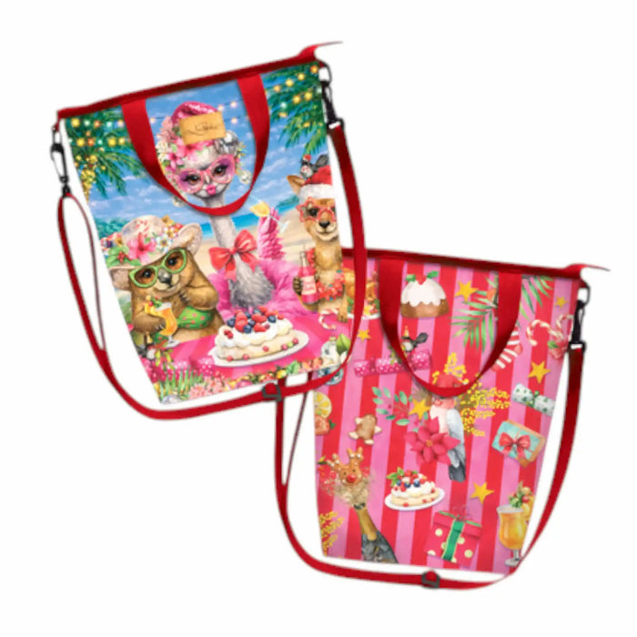 Two colorful shoulder bags with red straps and trim, shown on a plain white background. One bag features a whimsical animal picnic scene with a cake and festive decorations, and the other has pink vertical stripes with holiday-themed illustrations including gifts, a cake, and a cat.