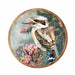 Midnight Australiana ceramic trivet featuring a kookaburra surrounded by pink native flowers.