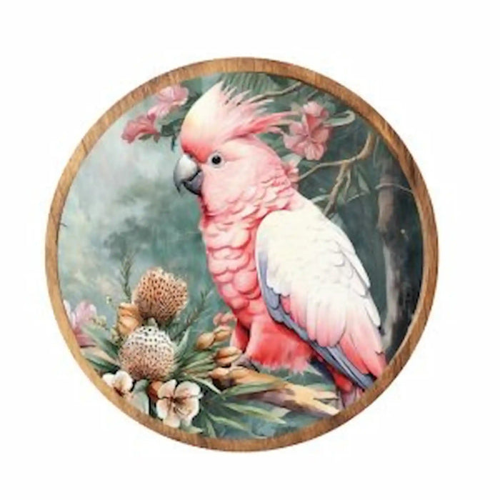 Midnight Australiana ceramic trivet featuring a pink cockatoo among Australian native flowers and foliage.