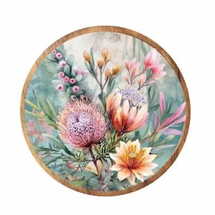 Midnight Australiana ceramic trivet featuring pink waratah flowers and Australian native foliage