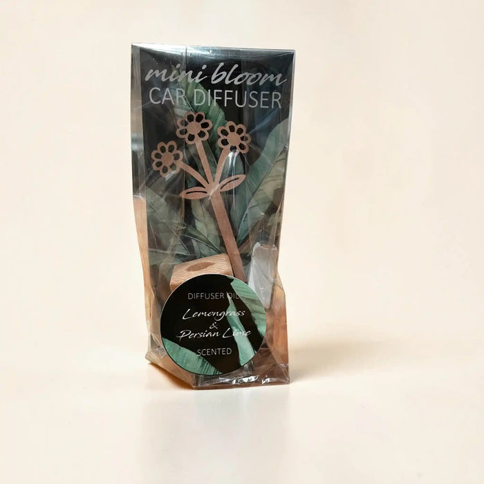 A packaged mini bloom car diffuser with a wooden flower-shaped diffuser and a round black label reading 'Lemongrass & Peppermint Scented'.
