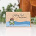 Cardboard box with a cartoon van and 'Getting Lost Road Trip Edition' text on a blurred background