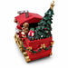 A festive Christmas-themed miniature storage box shaped like a red train car carrying a Christmas tree, ornaments, gifts, and Santa Claus, shown on a plain white background.