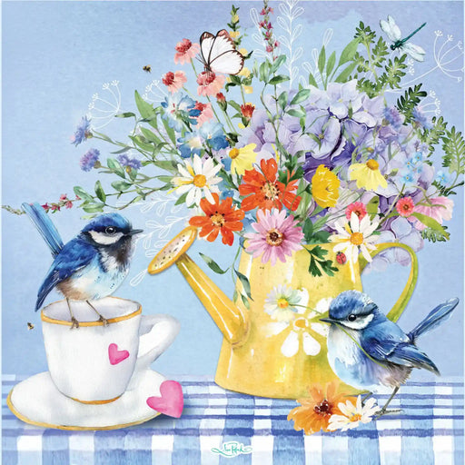 A colorful watercolor-style illustration of two blue birds around a yellow watering can filled with a bouquet of flowers, set on a blue-and-white checkered tablecloth beside a white teacup with a small bird perched on it.
