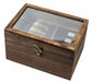 A rectangular dark brown wooden display box with a clear glass lid and a brass latch, shown on a plain white background.