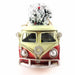 A vintage-style Christmas ornament shaped like a cream and red Volkswagen Type II van with a snow-covered tree on its roof, shown on a plain white background.