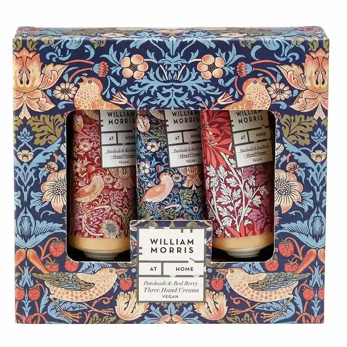 William Morris At Home Hand Cream Set in a decorative illustrated gift box. The set contains three hand creams with red, blue, and pink floral and bird patterns, displayed in a matching patterned box.