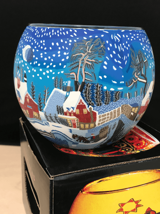 Glowing glass hot sale candle